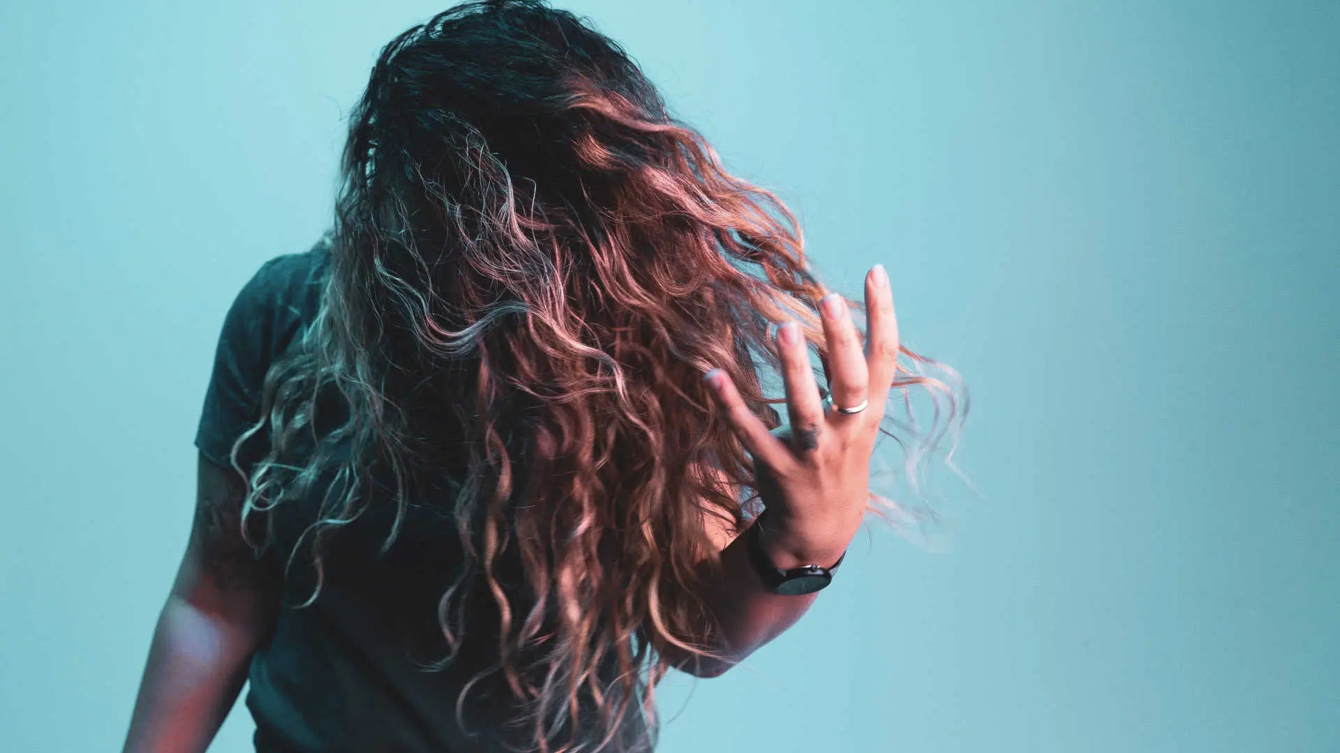 woman celebrating her curly hair