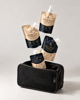 Wuli Travel Kit pouches dropping into the zip toiletry bag