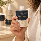 Wuli Curl Cream 50g travel pouch held in one hand to show its size