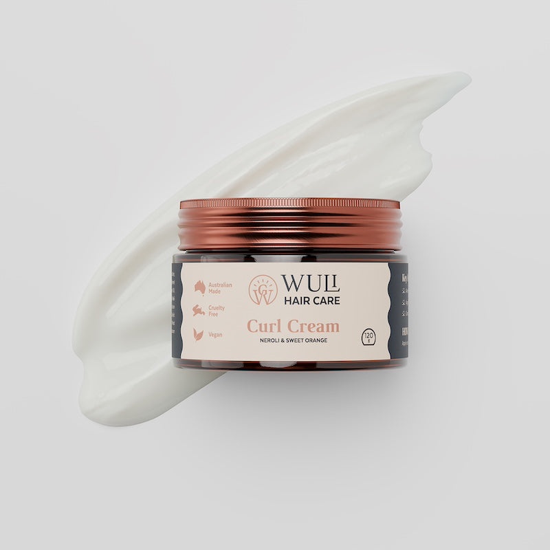 Wuli Curl Cream jar with product texture swatch