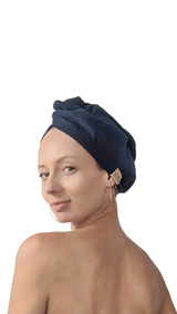 Wuli Hair Care natural fibre Hair Towel, a gentle drying towel designed to reduce frizz for natural curly and wavy hair on model, side view