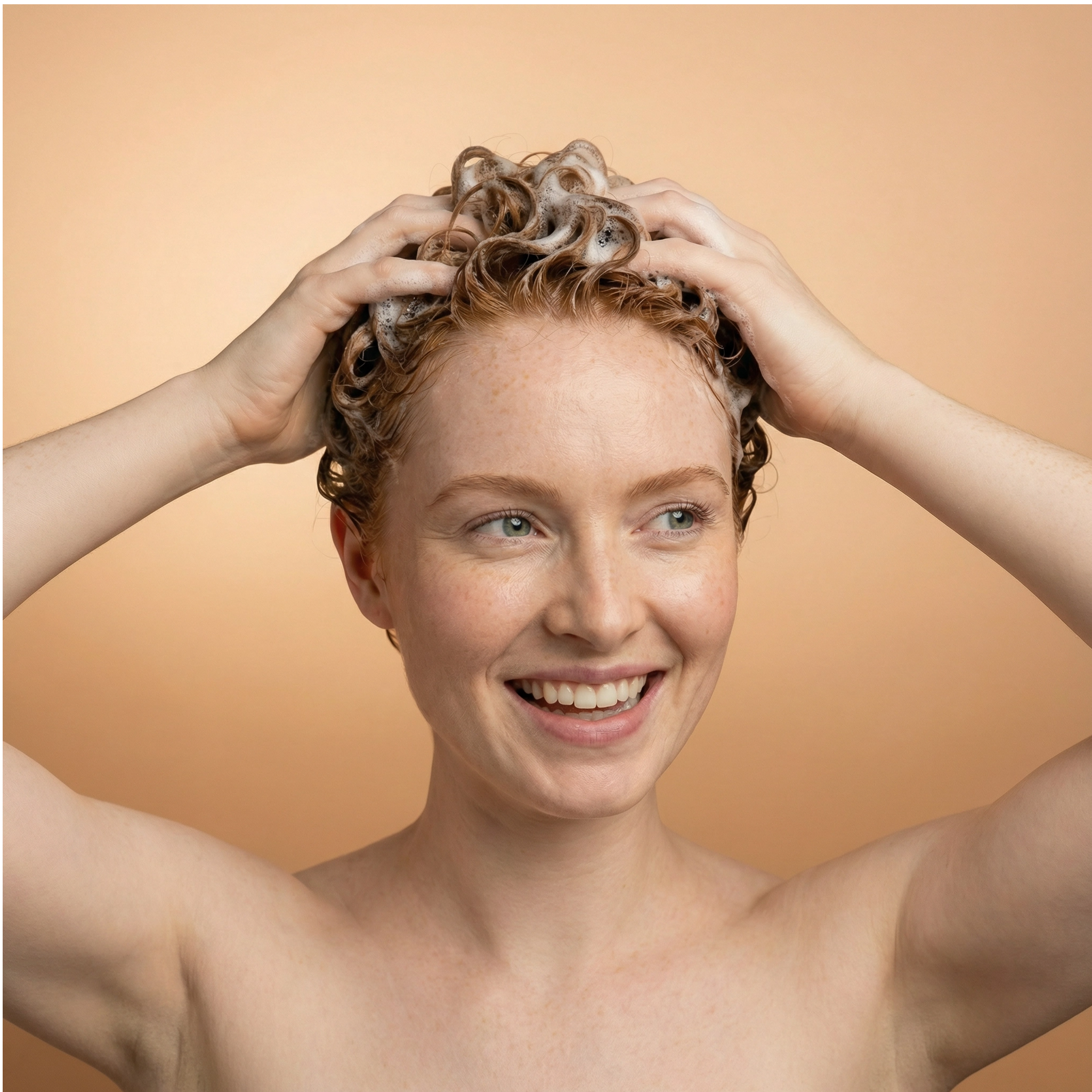 Woman with wet hair on a beige background